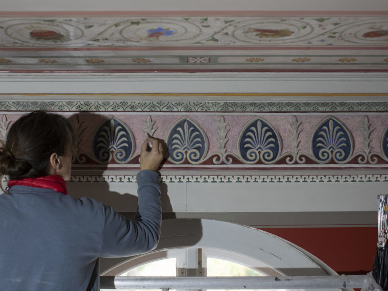 Carlsberg Academy conservator working in the Garden Room Elgaard Architecture